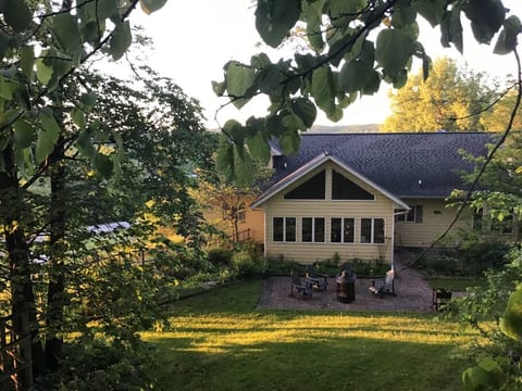 Oneota Vista, a cozy apartment tucked in the woods of the Oneota Valley bluffs, featuring 7.5 acres to explore and a breath-taking view.