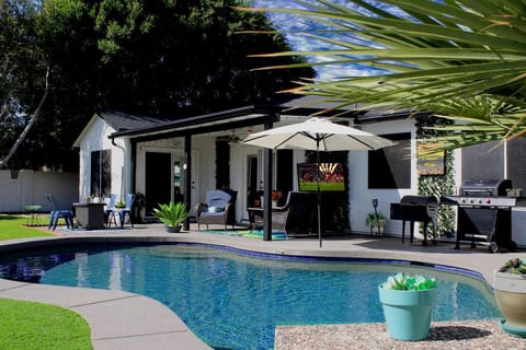 This backyard is waiting for you! It's always pool season here, with a relaxing heated pool in the Winter. This Pool House is calling your name!