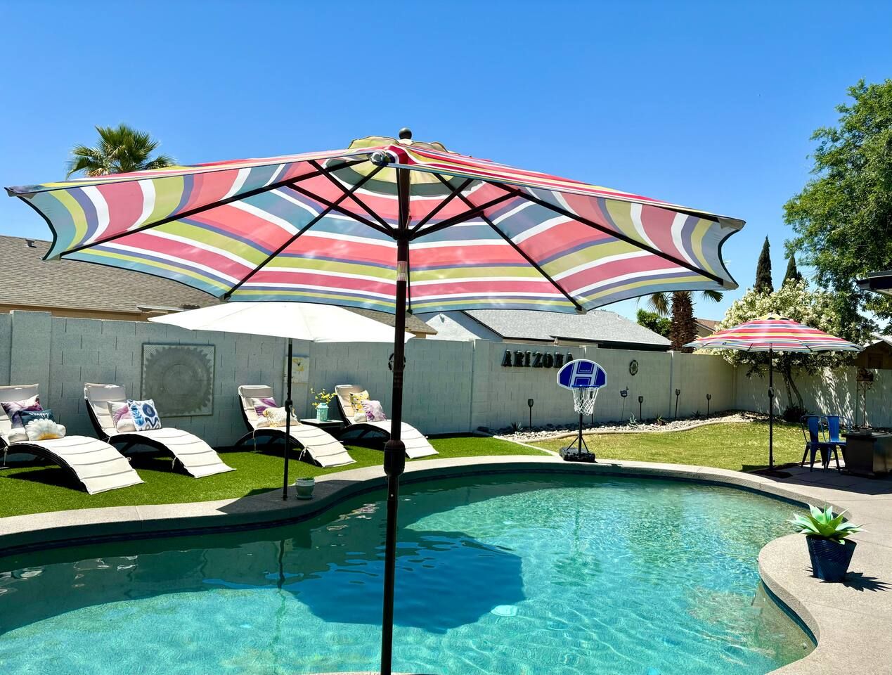 Umbrellas for extra sun protection and shade. Stadium Oasis Glendale, Arizona