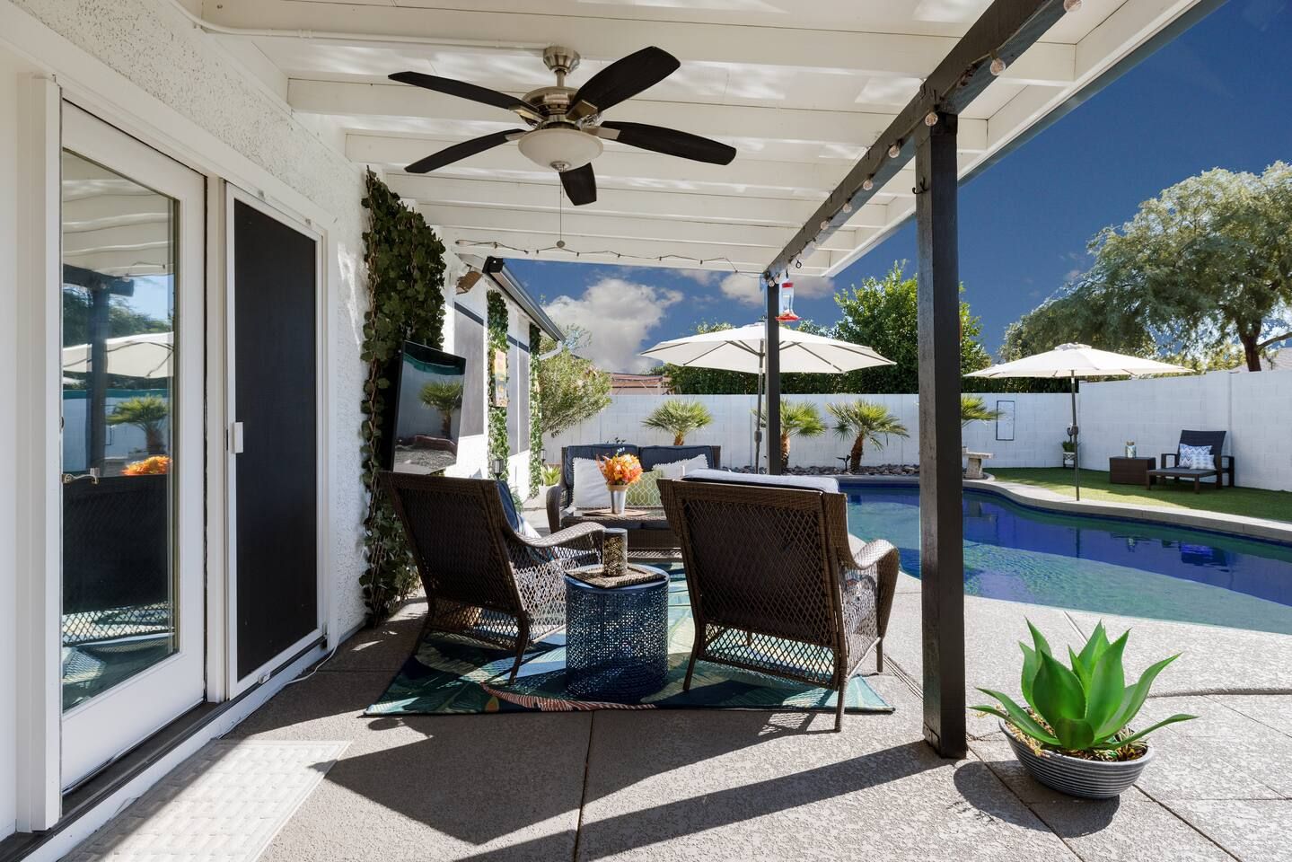 Ceiling fan and covered patio with TV. Stadium Oasis Glendale, Arizona