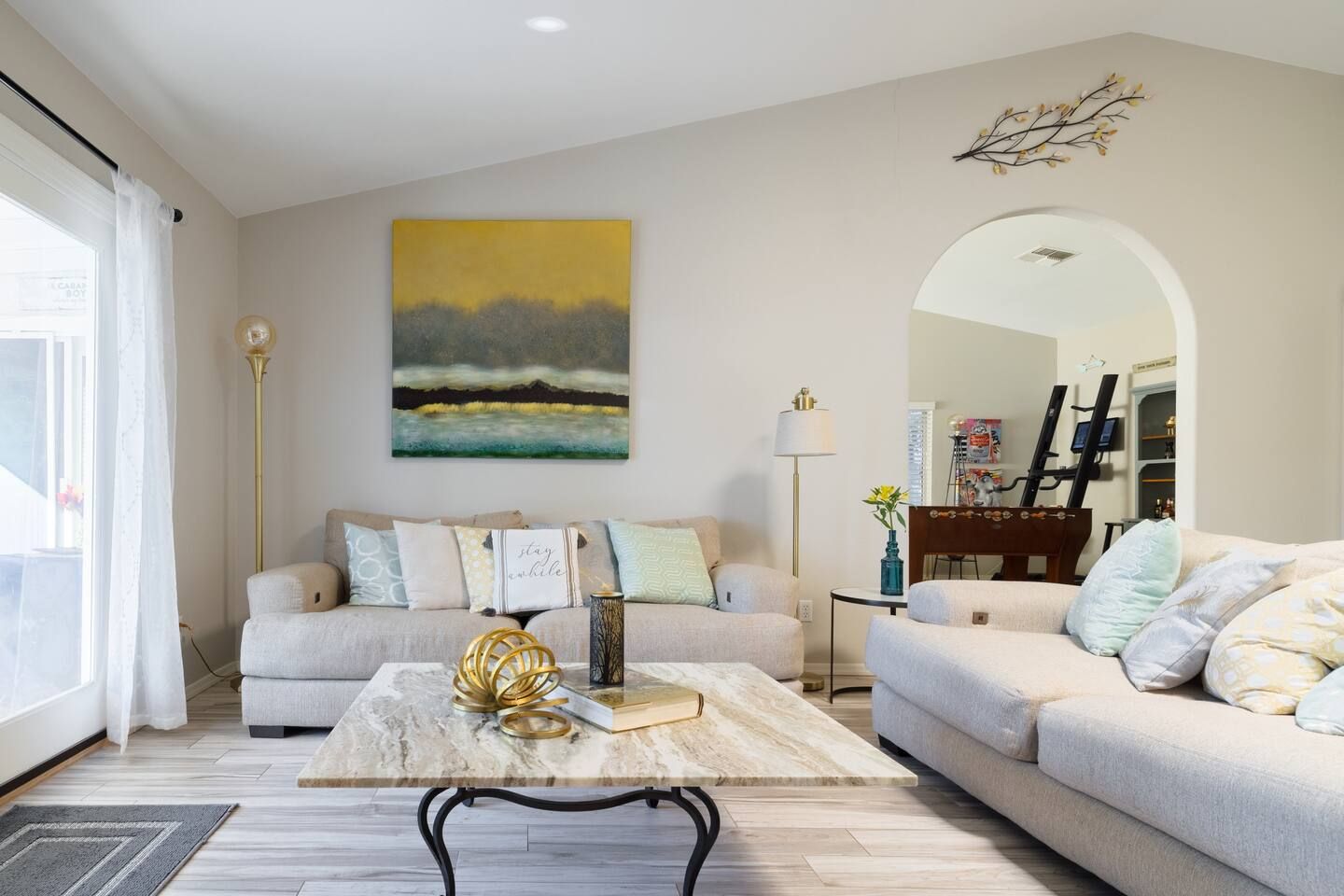 Comfy couches and pillows in the living room. Stadium Oasis Glendale, AZ