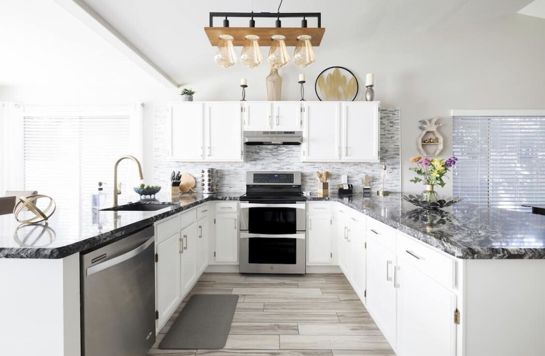 Well stocked kitchen with new appliances, double oven and ice maker