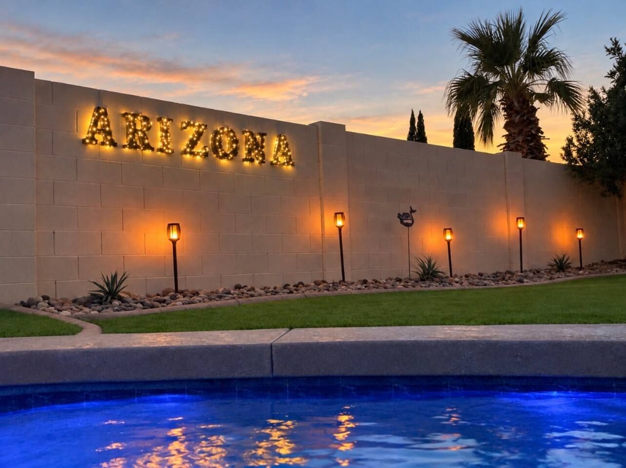 Backyard comes alive at night with ambient lights. Stadium Oasis Glendale, Arizona