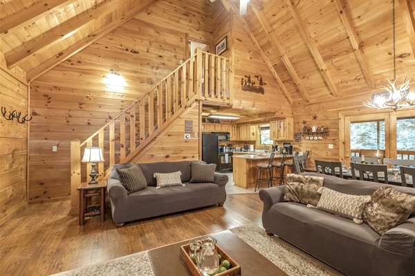 Gather your family and friends in this spacious living room with high ceilings for moments of togetherness and laughter!