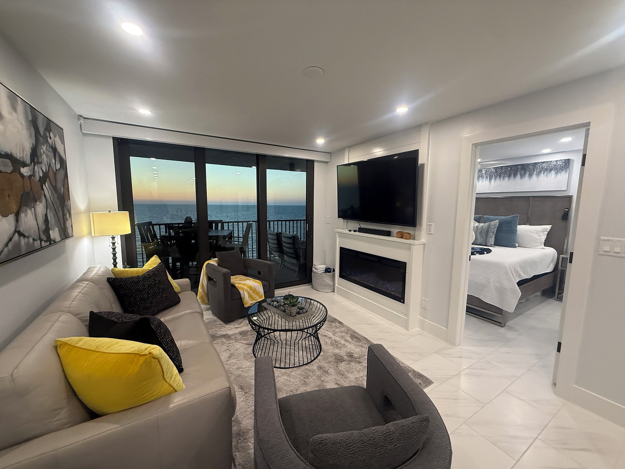 New sliding doors in living room and primary bedroom for easy access to lanai