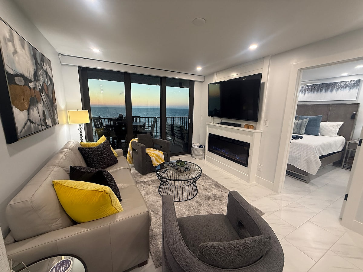 Living room with beautiful sunset view; Additional guests? Recover from the day in our Queen sleeper sofa Remodeled Aveline | 2 King Bed Ensuites | Sunsets
