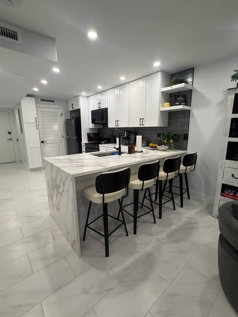 Dining Area and remodeled kitchen with new lighting throughout 