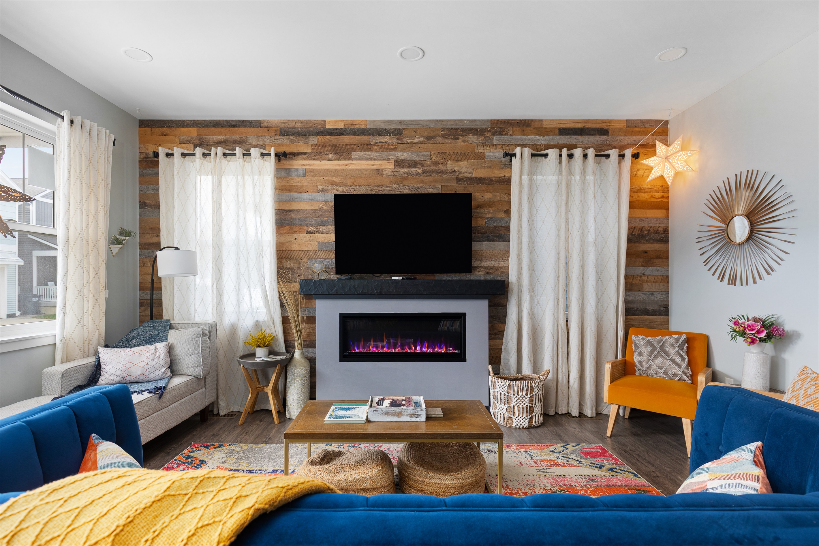 Living room space with warm, cozy fireplace