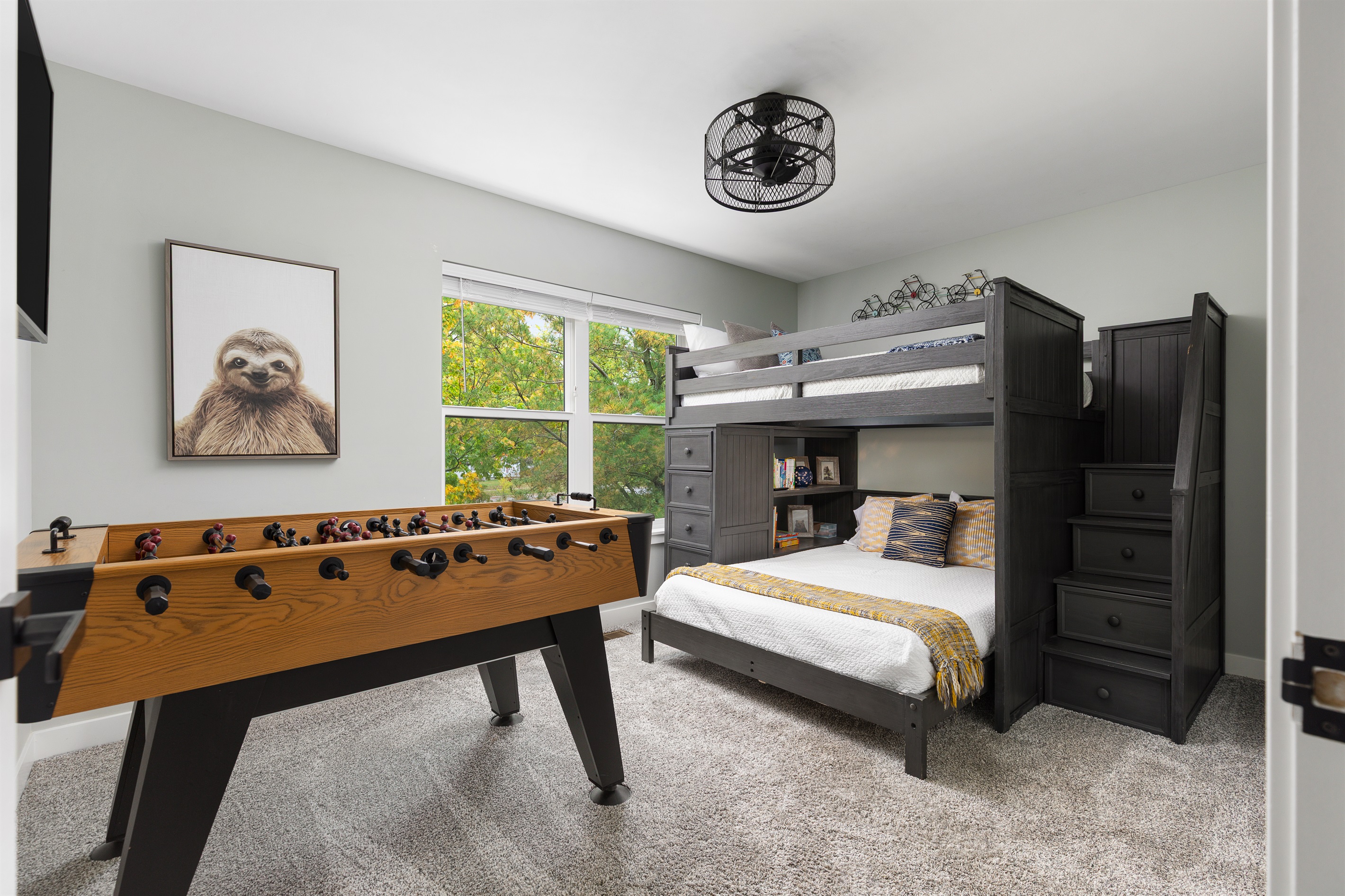 Second bedroom with full over full bunks, foosball and many toys and books!