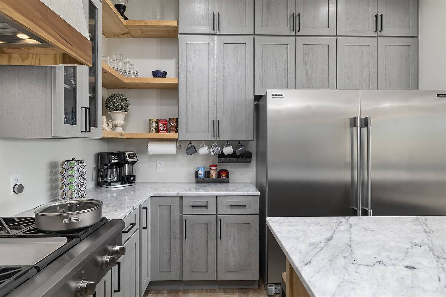 Gas Stove, Coffee Maker, Enough dishes for your entire group