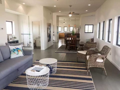Living Room, downstairs has an open floor plan, perfect for entertaining guests