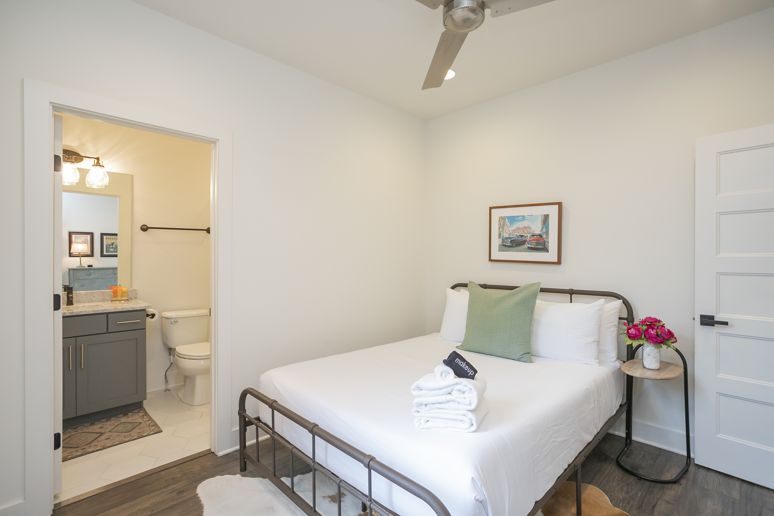 Second bedroom (queen) with en-suite bathroom and private balcony