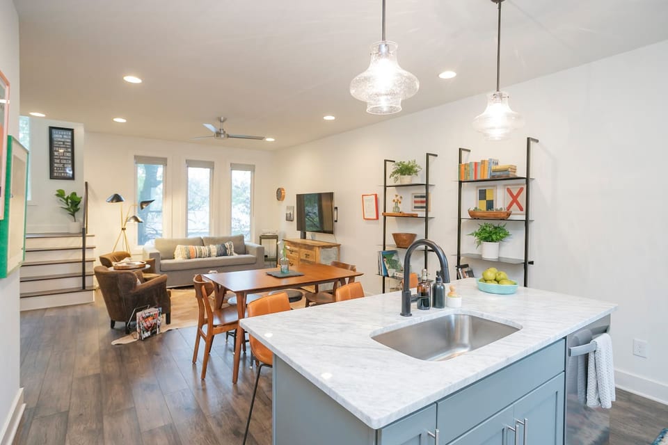2nd floor has open-concept kitchen/dining/living