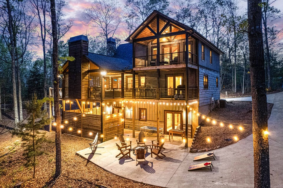 This exclusive home boasts upscale amenities, with outdoor entertainment, in a natural wooded setting