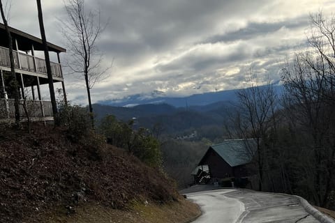 Street view of the Smokey Mountains on a cloudy day.