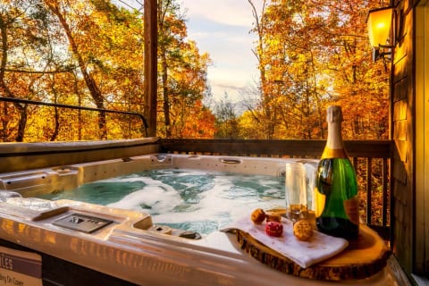 Soak away your stress and relax in luxury with a soak in our hot tub overlooking trees and mountains. The perfect way to unwind and rejuvenate.
