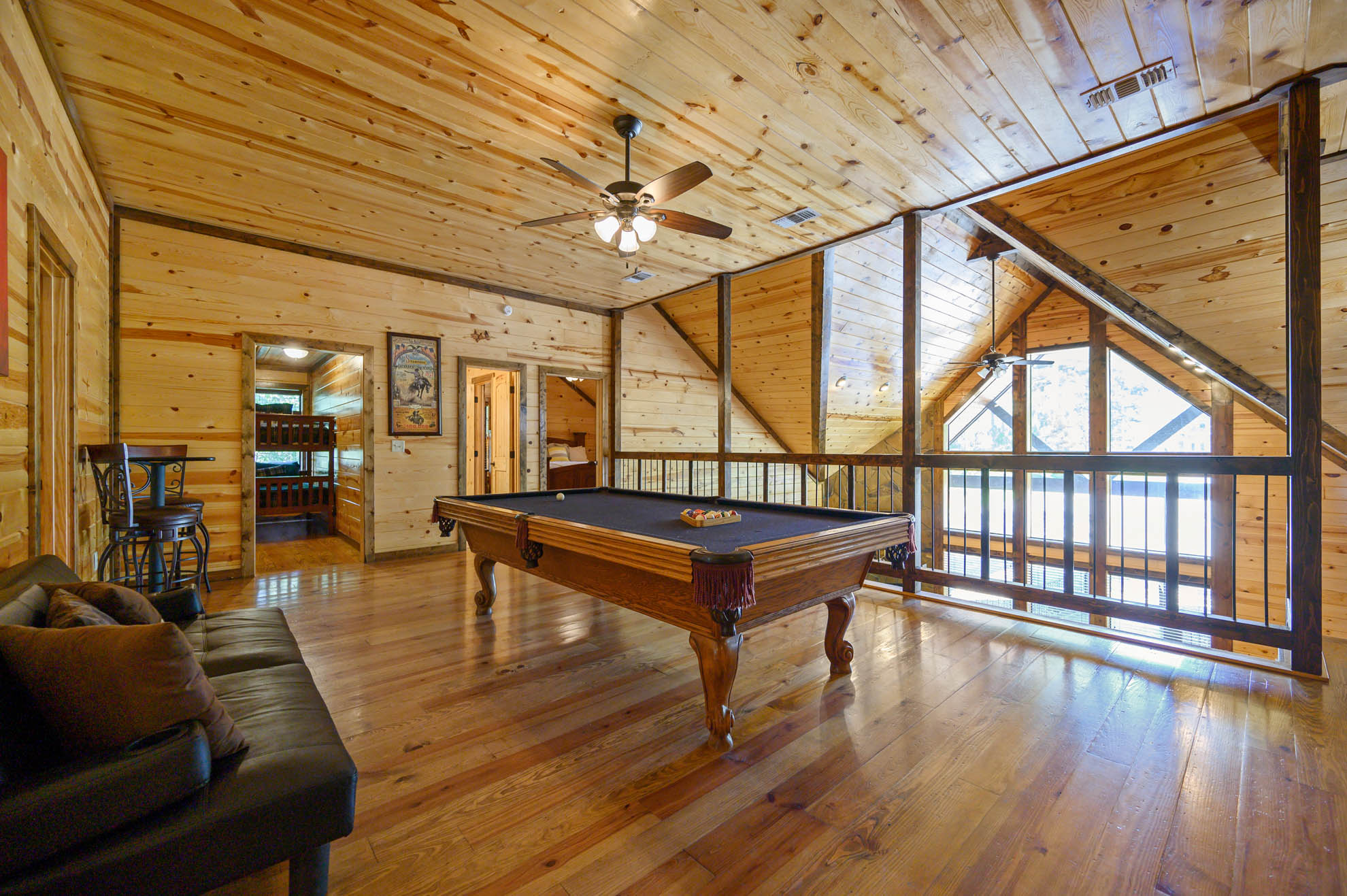 The gaming loft features two sets of bar stool seats (4 chairs, 2 tables) The gaming loft features two sets of bar stool seats (4 chairs, 2 tables) - Iron Horse Lodge - Broken Bow