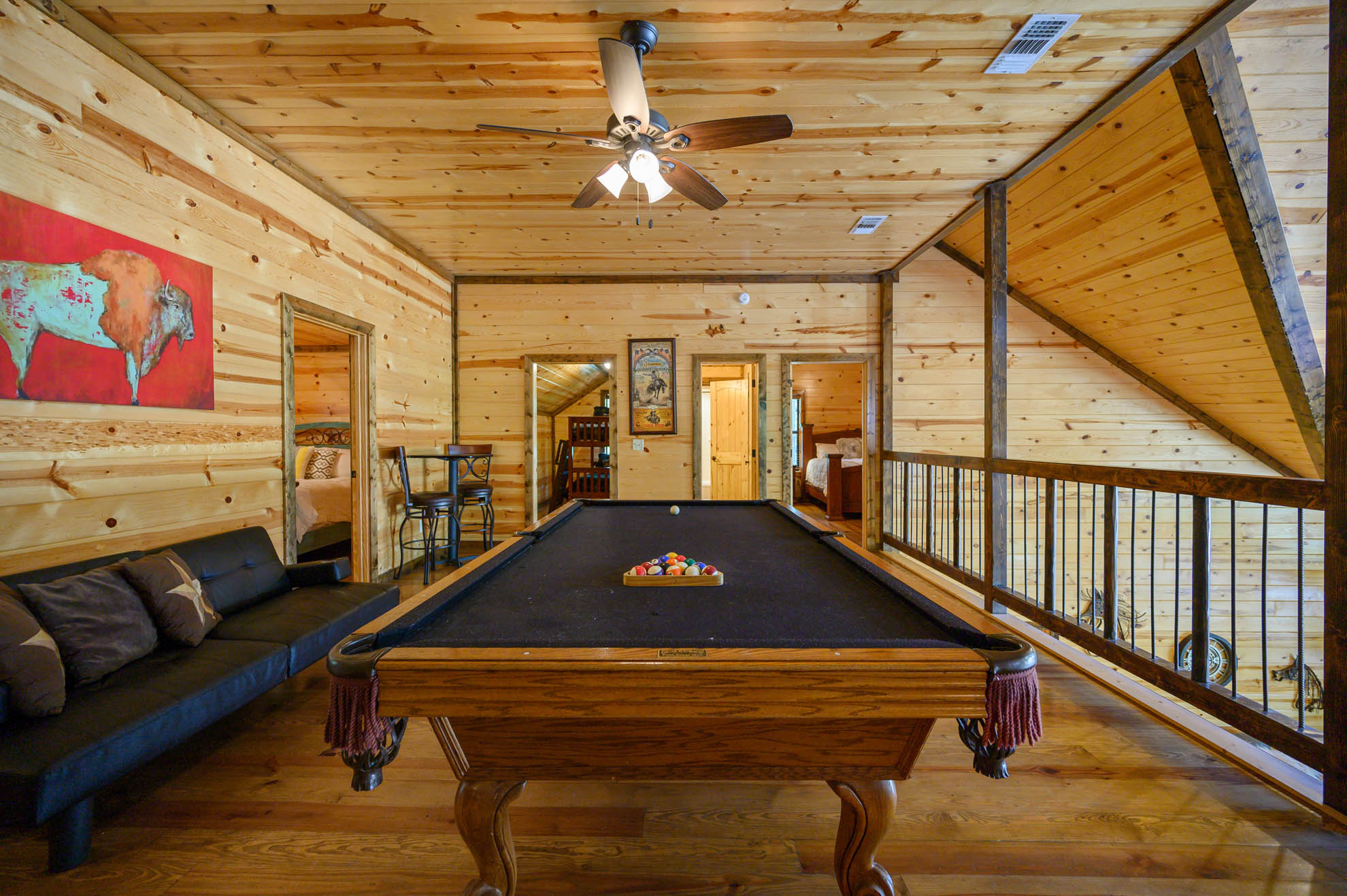 The gaming loft includes a pool table, arcade game, infinity table, board games and a sleeper couch The gaming loft includes a pool table, arcade game, infinity table, board games and a sleeper couch - Iron Horse Lodge - Broken Bow
