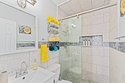 The bathroom is equipped with all the amenities you will need. Loofahs, toothpaste, and a hair dryer can be found in the vanity.