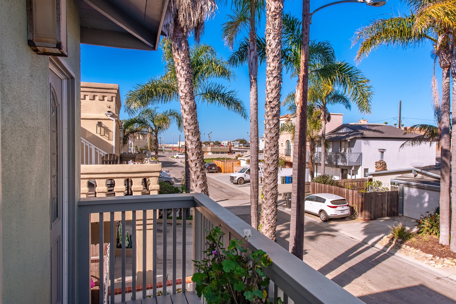 Harbor Breeze Dining: Dine with a view on the balcony adjacent to the dining room, capturing the scenic charm of the nearby harbor. - Temporary Sanity - Oxnard