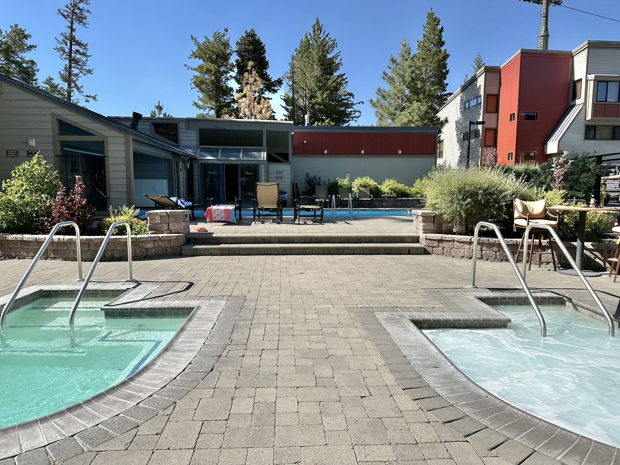 Pool area with 2 outdoor year round heated jacuzzis and 1 indoor