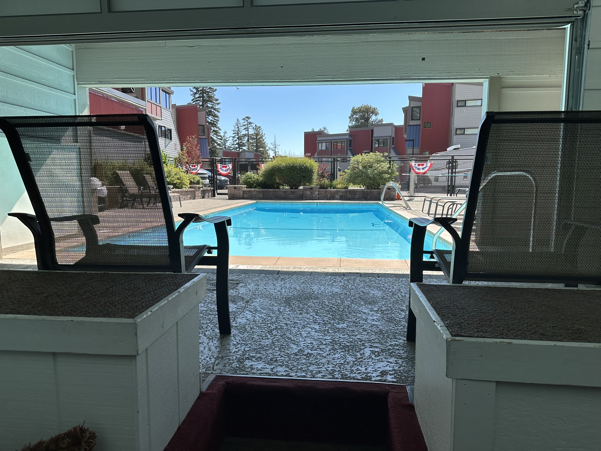 Indoor entrance to pool and firepit