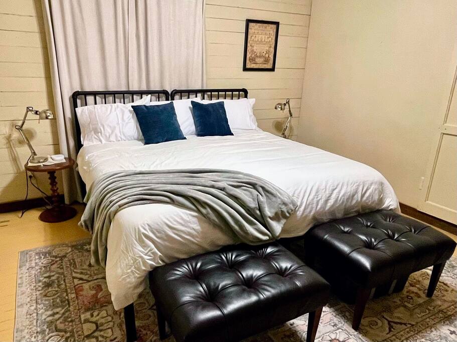 Back bedroom can be configured into a king with the TwinXL beds bound together and made into a King. (same room as previous pic) - Spacious 3/2 with Historic Charm & Modern Comfort - Gatesville