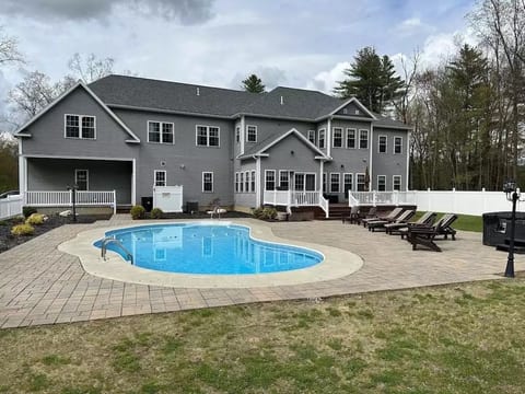 Looking for your own private  retreat getaway in Saratoga Springs, New York?

Please consider staying at our rental in Saratoga Springs!

Our large secluded estate like home sits on
10 acres of private property and consists of 
9 total beds including sofa beds, 5 bathrooms private dedicated workspace/office, indoor fireplace, 4 car temperature controlled garage home on 6,000+ square feet of living space on 2 floors. 

Other amenities include in ground heated pool, hot tub, jacuzzi, 24 hour property management team, chef service referral, and keyless entry. 

Our home is just minutes to Saratoga Racetrack, Saratoga Lake, Browns Beach, downtown Saratoga, Saratoga Casino, Saratoga Golf Course, Saratoga Performing Arts Center (SPAC), Saratoga Spa State Park, fishing, hiking, art galleries, museums,  parks, gardens, farmers markets, natural mineral springs, comedy clubs, fine dining (restaurants, bars, wineries, breweries), shopping, entertainment), outdoor sporting and amusement parks. Only 20-30 minutes to West Mountain for skiing and tubing, Glens Falls & Lake George!