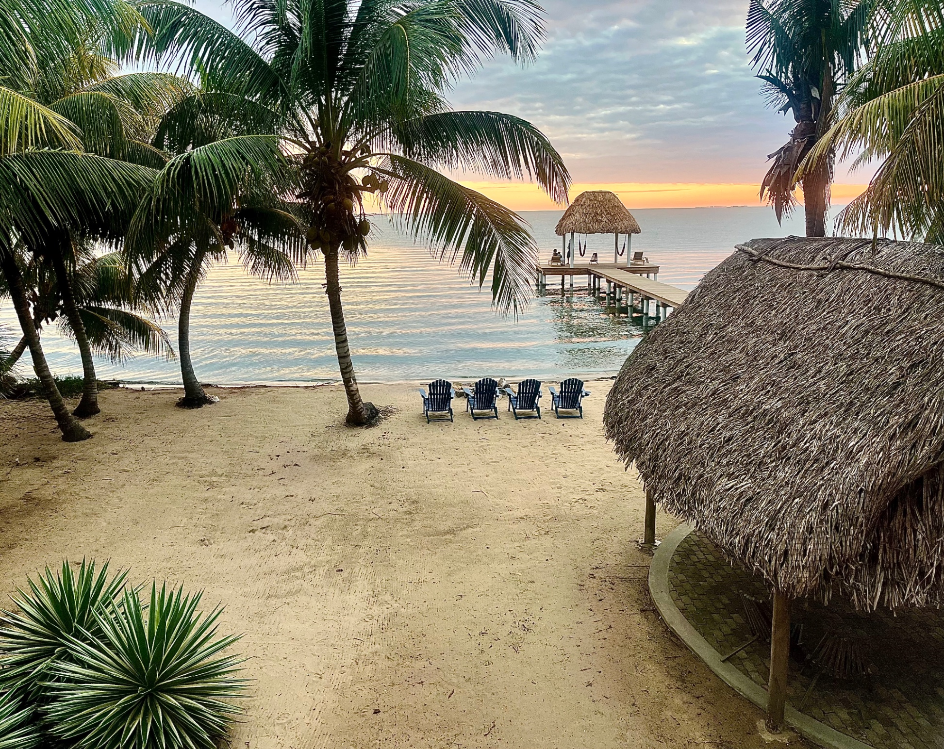 Step out of the villa directly onto the beach