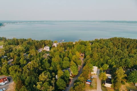 Drone view of the bay and condo complex.