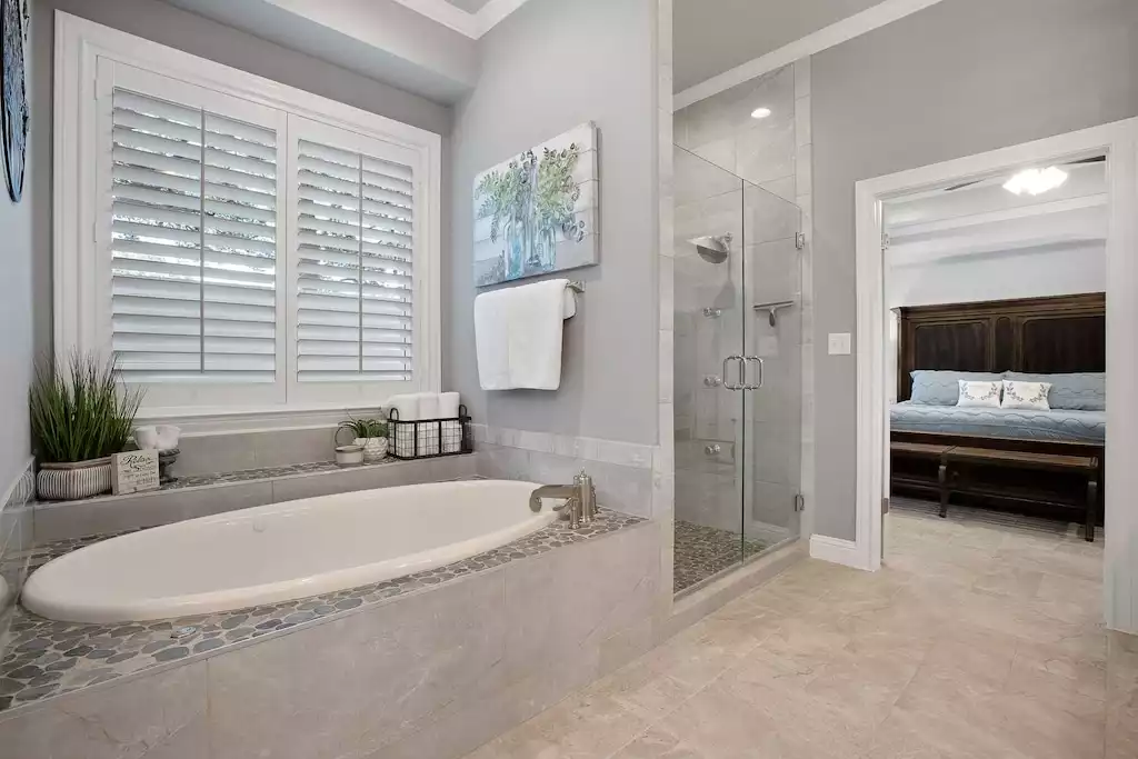 Jet tub and frameless glass shower allow for spa-like relaxation. Bathroom #1 Jet tub and frameless glass shower allow for spa-like relaxation. Bathroom #1 - Main House at Whispering Oaks Estate - Dripping Springs