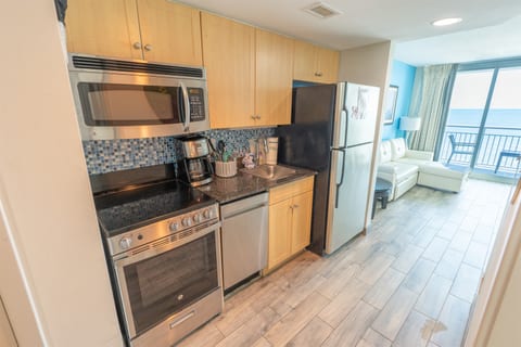 Full Sized Modern Appliances in Kitchen Area