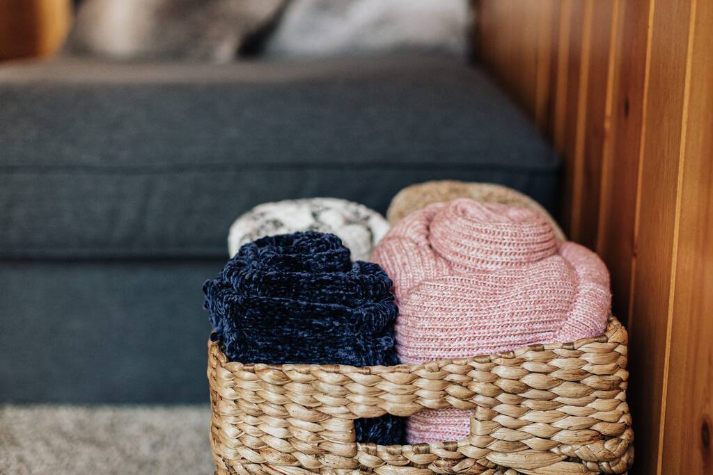 Cozy up with one of our cabin’s soft throw blankets. 