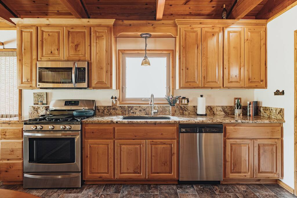 Dishwasher for easy cleanup and stainless steel appliances throughout.