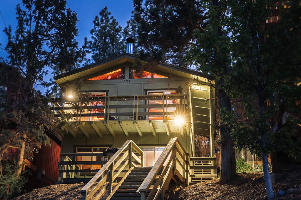 A well lit pathway to our back deck where you will find the  entrance to the cabin.