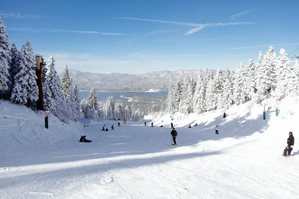 Ski and snowboard with lake views.