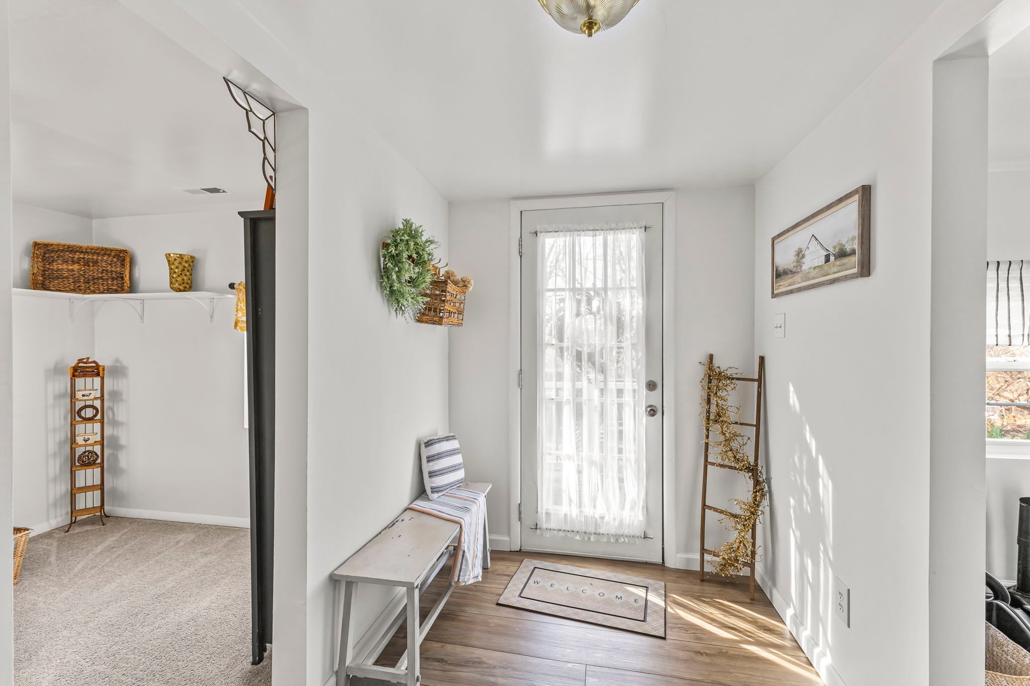 Foyer view (office to the left, laundry room on right)