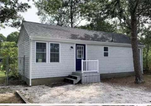 Front of the house with a driveway that accommodates 2 cars