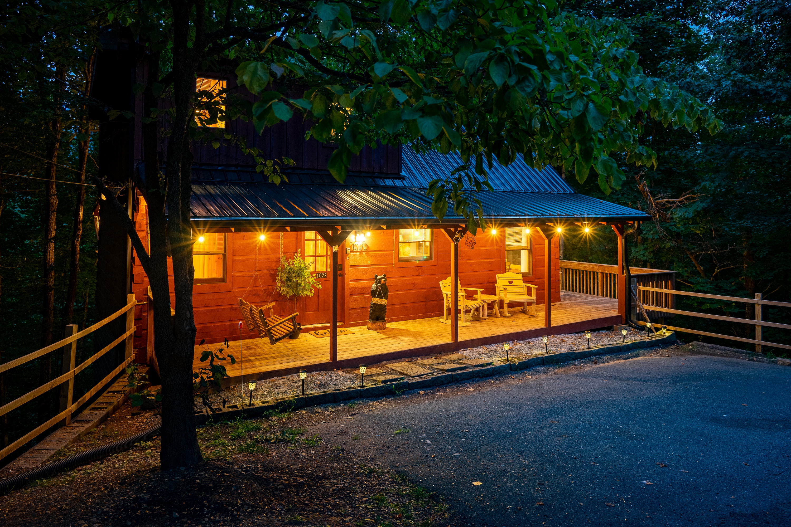 Charming and inviting front porch welcomes all of our guests for a relaxing stay