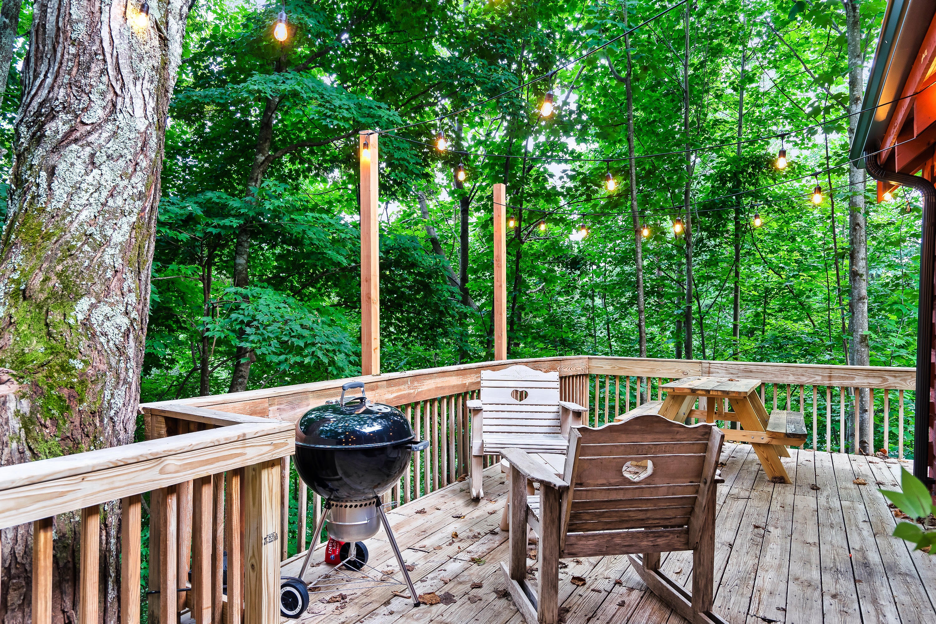 Whether you're looking forward to grilling or simply just relaxing under the trees, you can have it all!