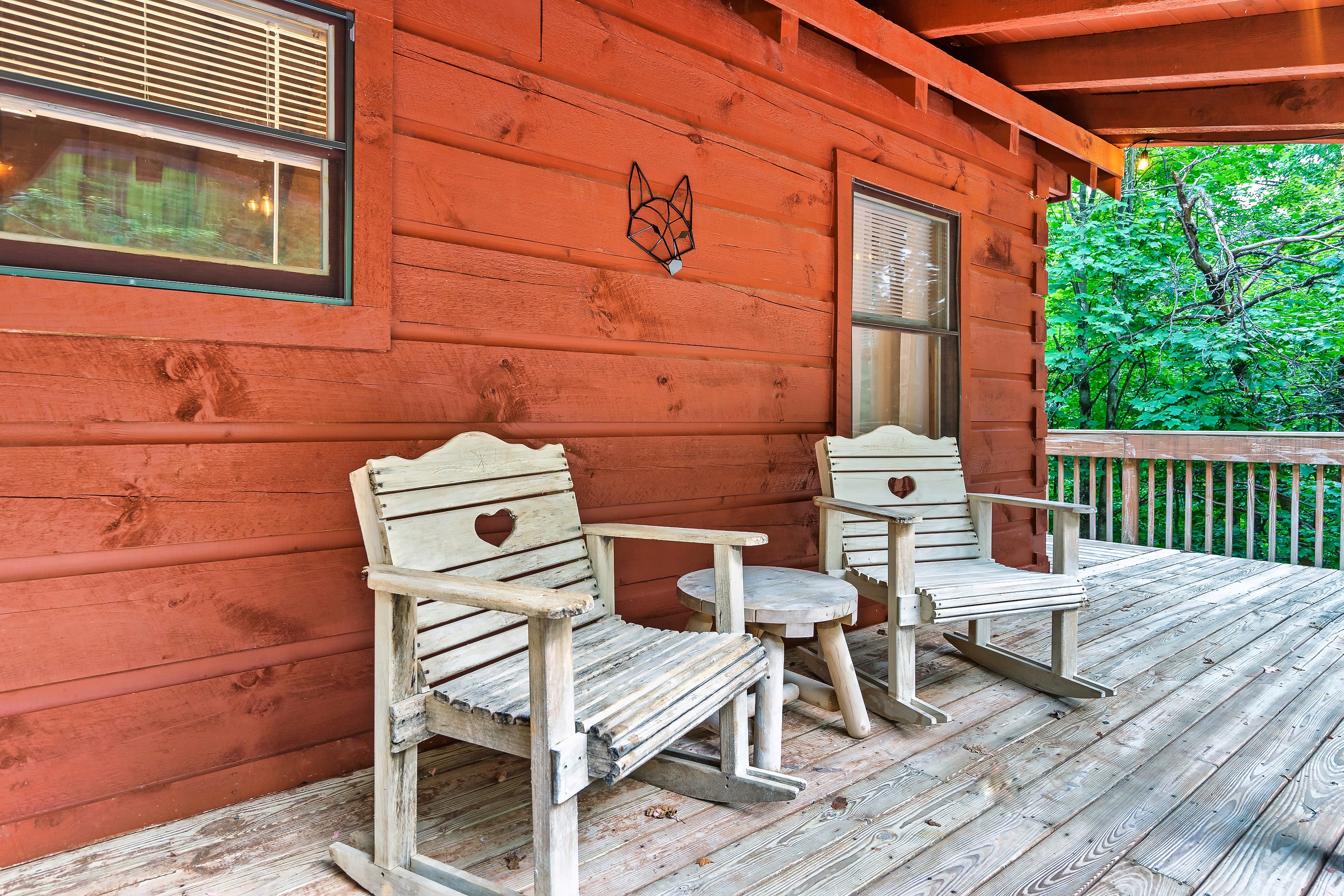 Charming and inviting front porch welcomes all of our guests for a relaxing stay