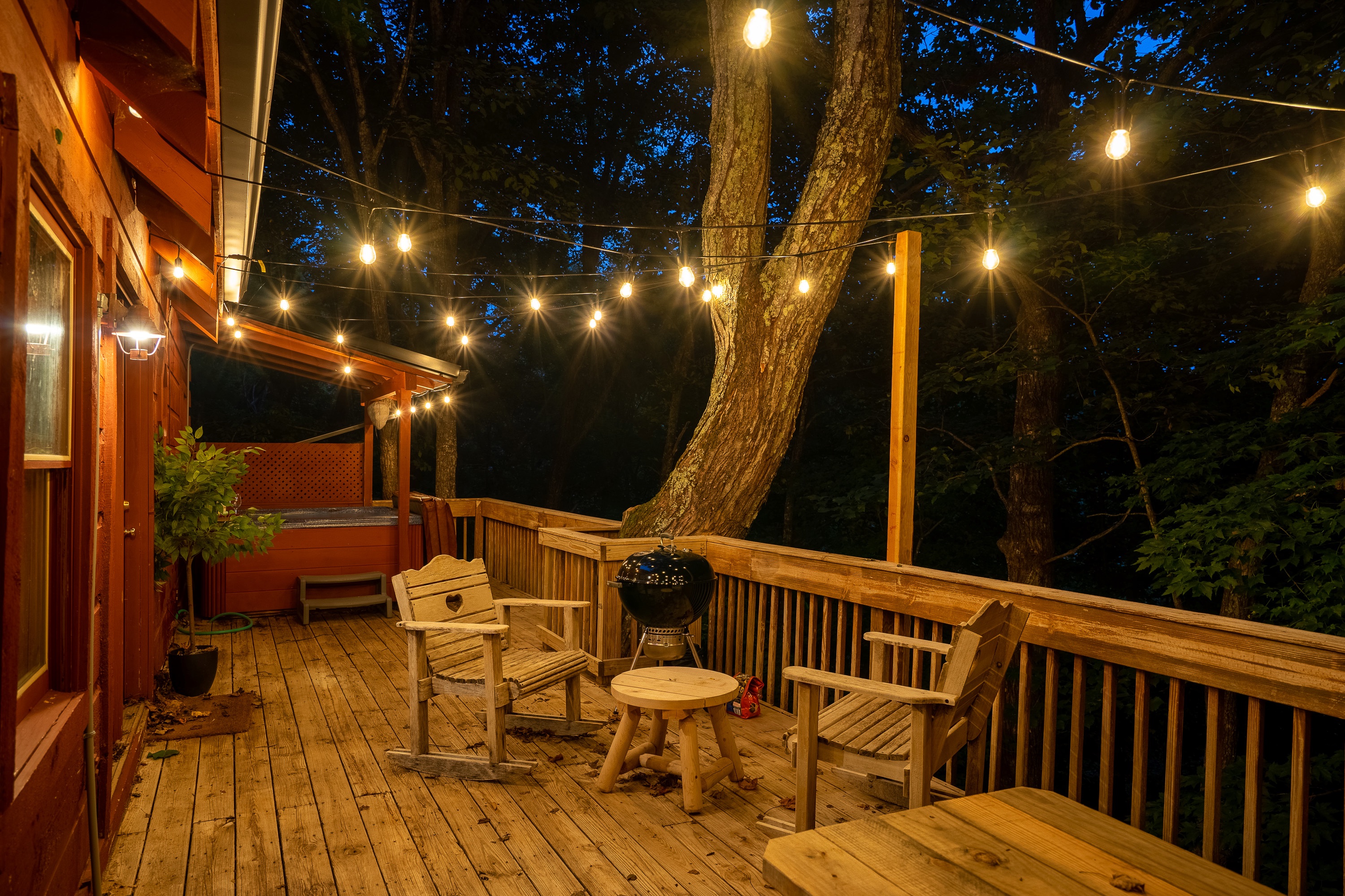 Whether you're looking forward to grilling or simply just relaxing under the trees, you can have it all!