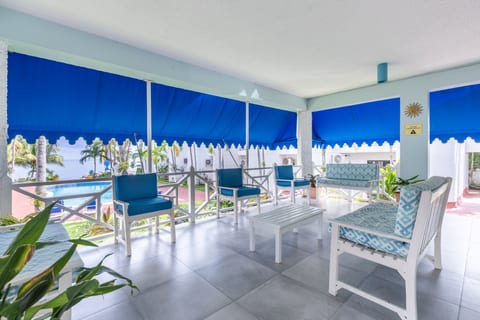 What a welcome! The entrance lobby with a view of our pool and our private beach beyond.