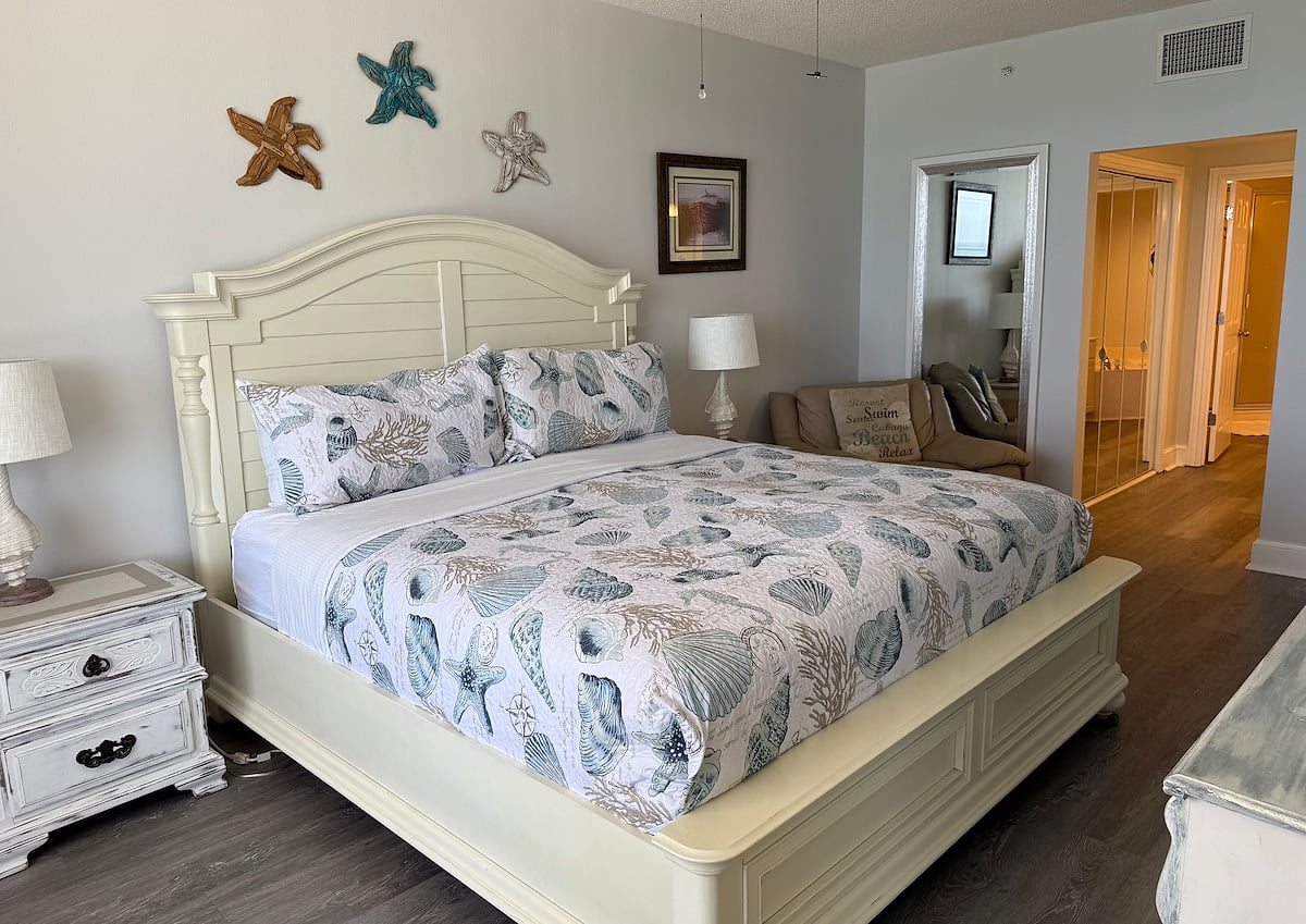 Beachfront master bedroom with King bed, balcony access and large en-suite master bath