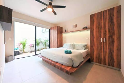 Beautiful ample king size bed with your own private outdoor patio, mosquito nets installed so you can bread the fresh air every morning!
