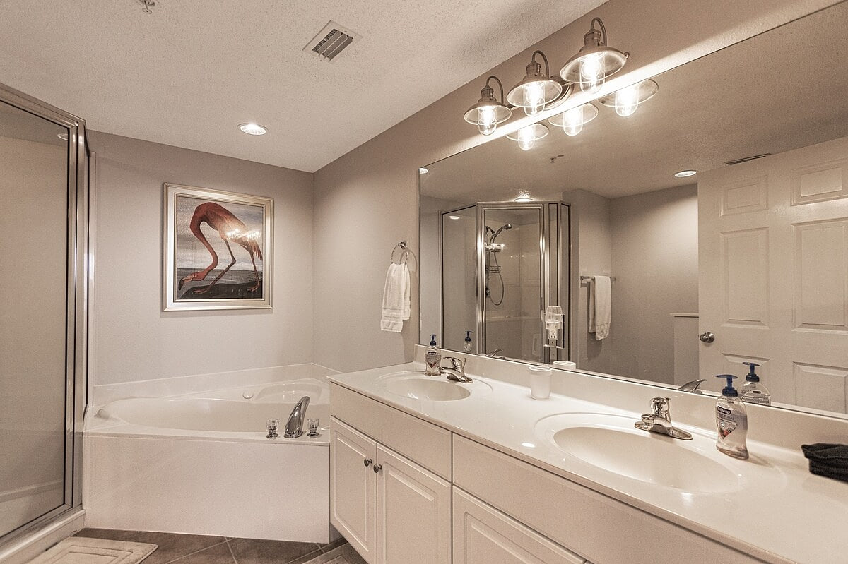 Master bath has double sinks, walk in shower and jetted tub