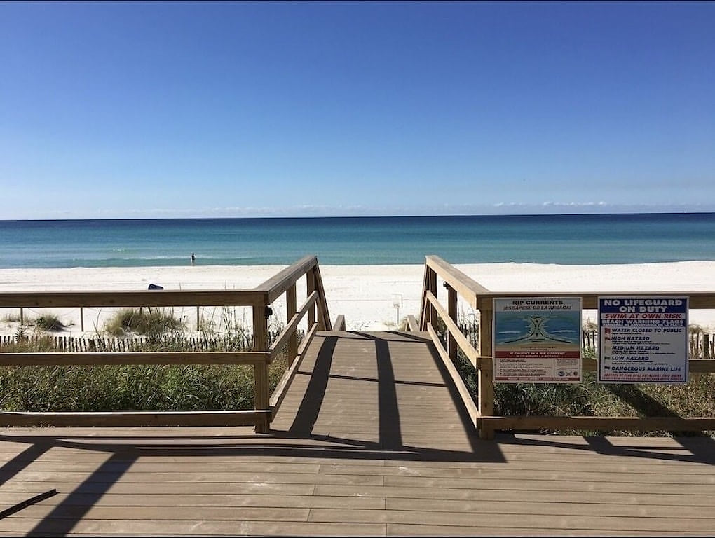 Direct beach access with stairs and a ramp. 