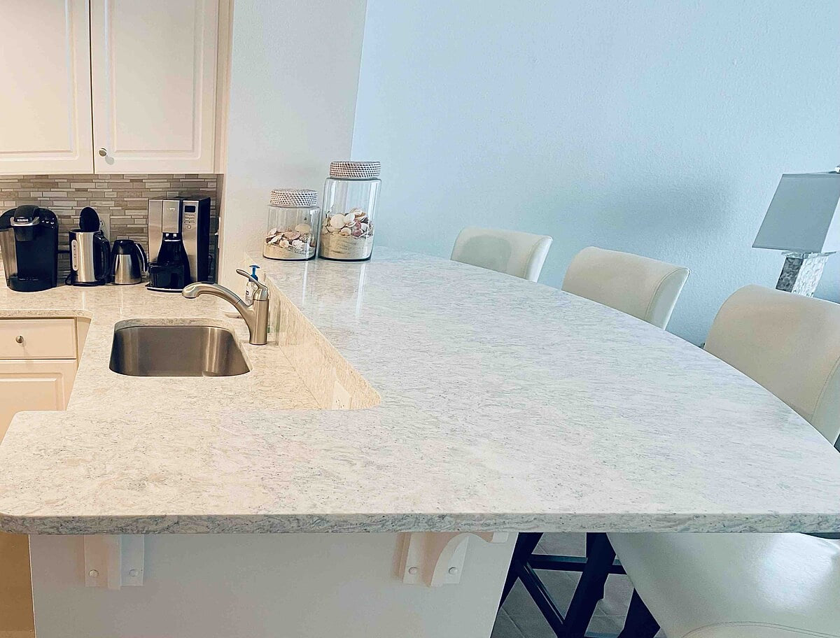 Stunning quartz counter tops with bar seating