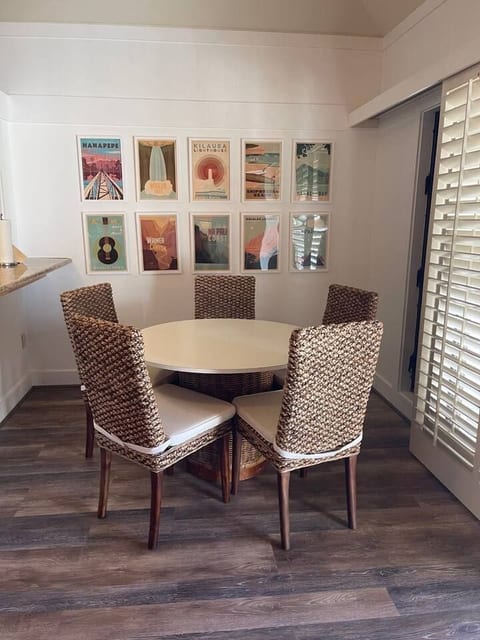 Dining Room featuring seating for 5 and Kauai vintage art by a local artist
