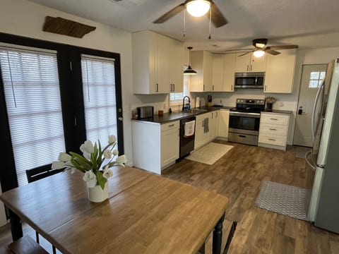 Kitchen and dining room. Table expands for additional room.
